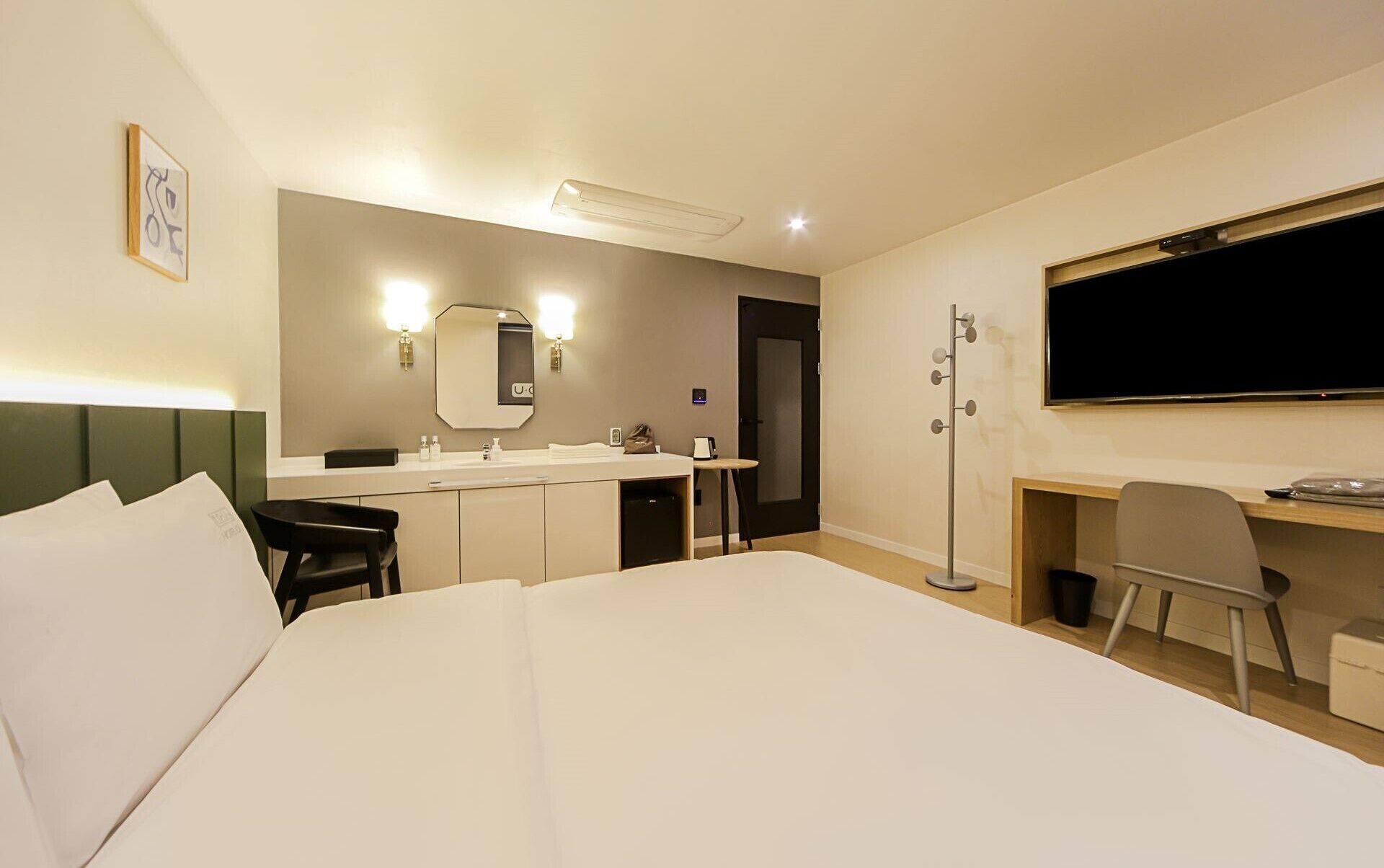 premium room | premium bedding, desk, laptop workspace, blackout curtains