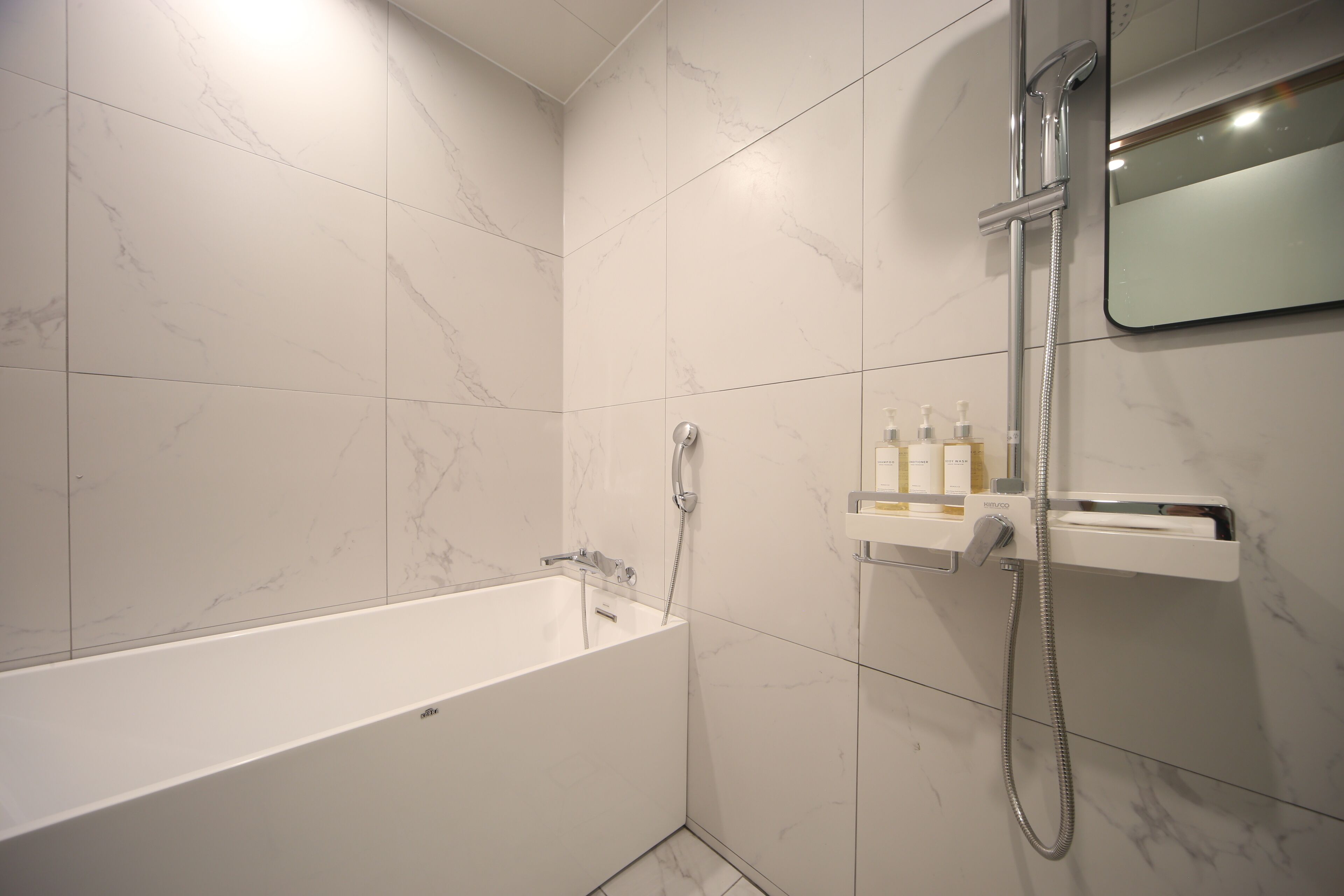 deluxe twin room | bathroom | free toiletries, hair dryer, bathrobes, slippers