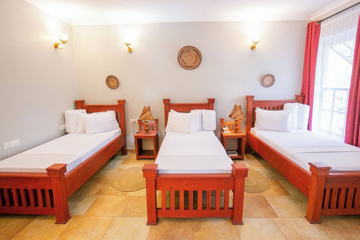 Family Triple Room | Down duvets, blackout curtains, free WiFi, bed sheets