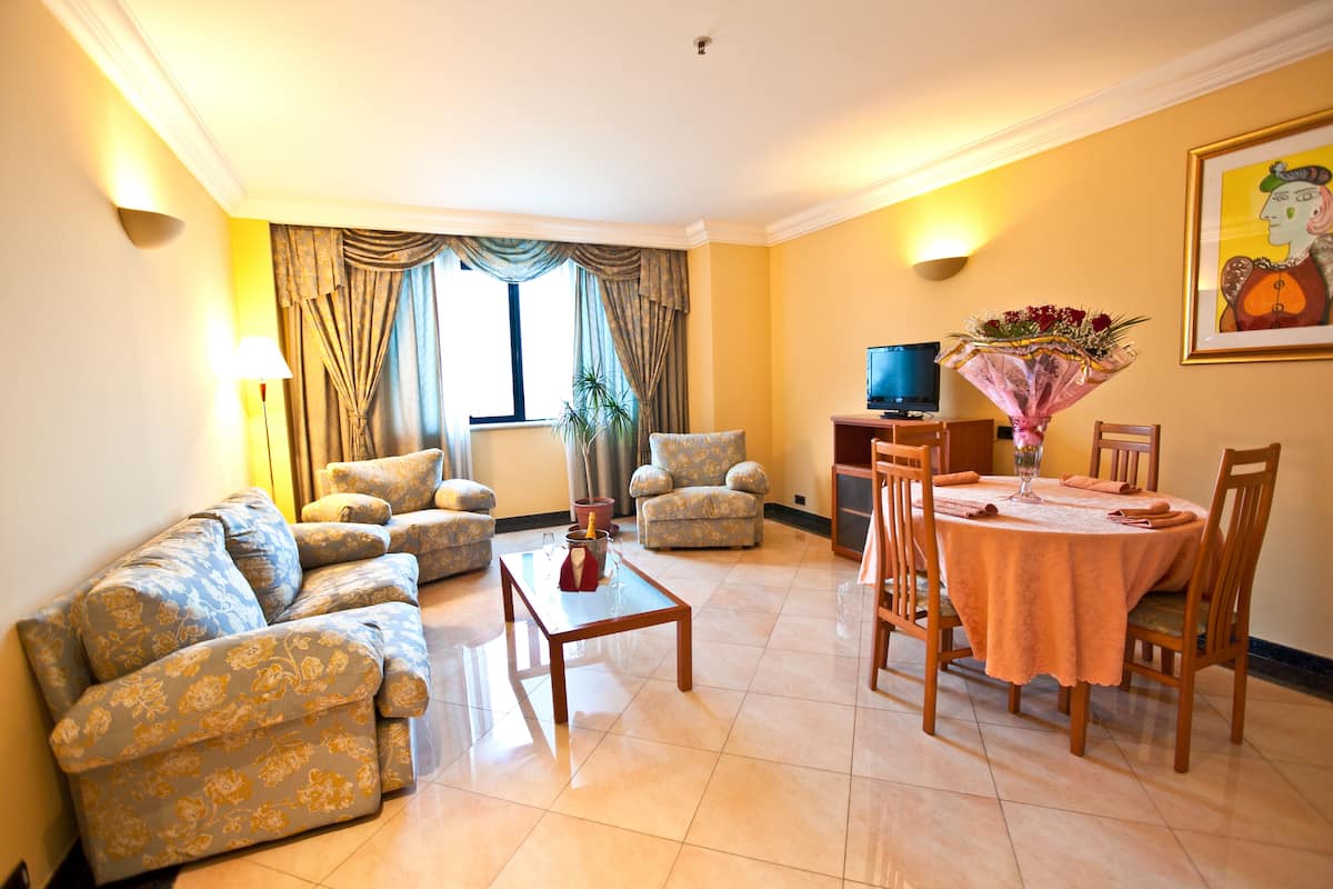 Comfort Apartment | Living area | 40-cm LED TV with satellite channels, TV, DVD player