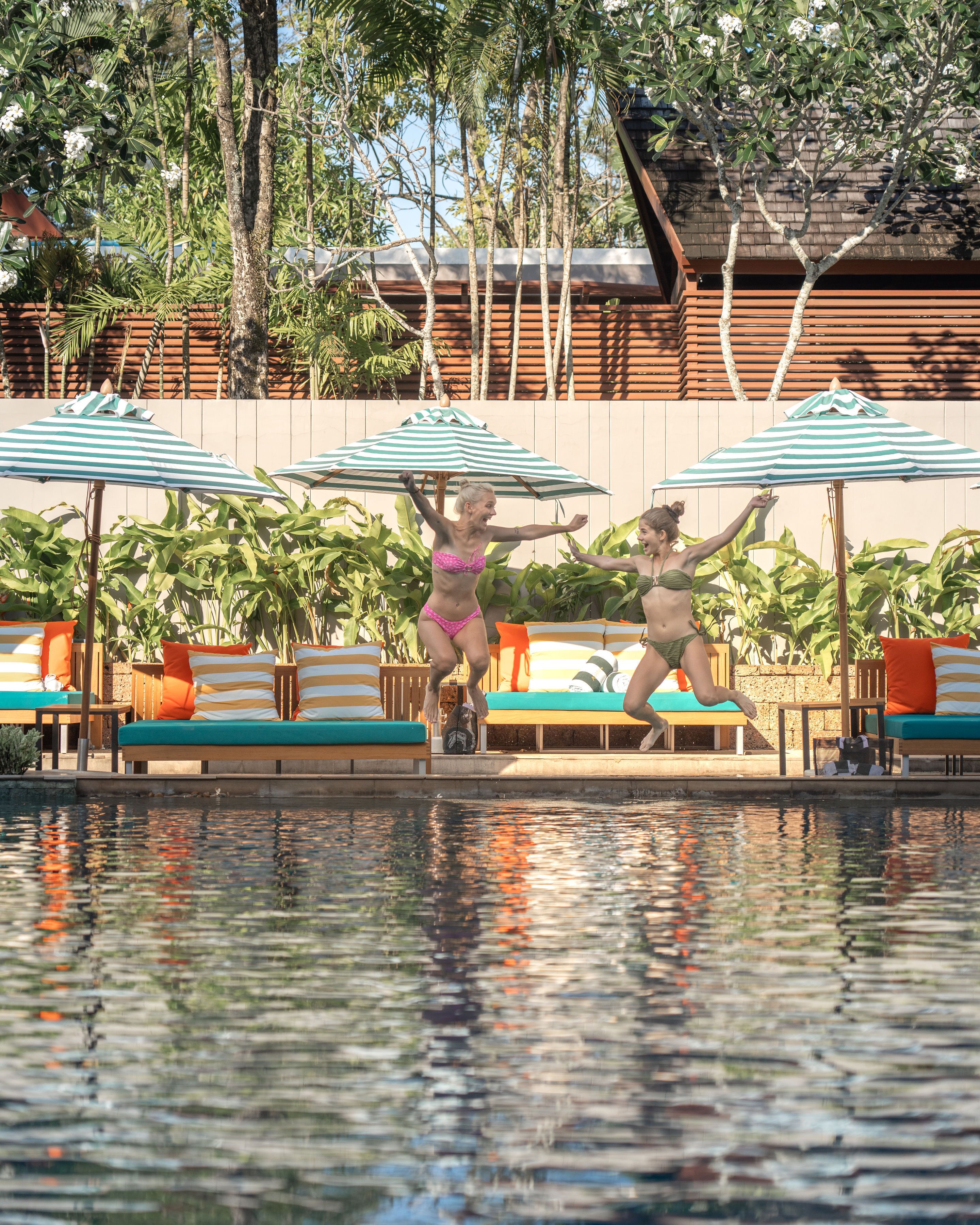 outdoor pool, open 6:00 am to 6:00 pm, pool umbrellas, pool loungers