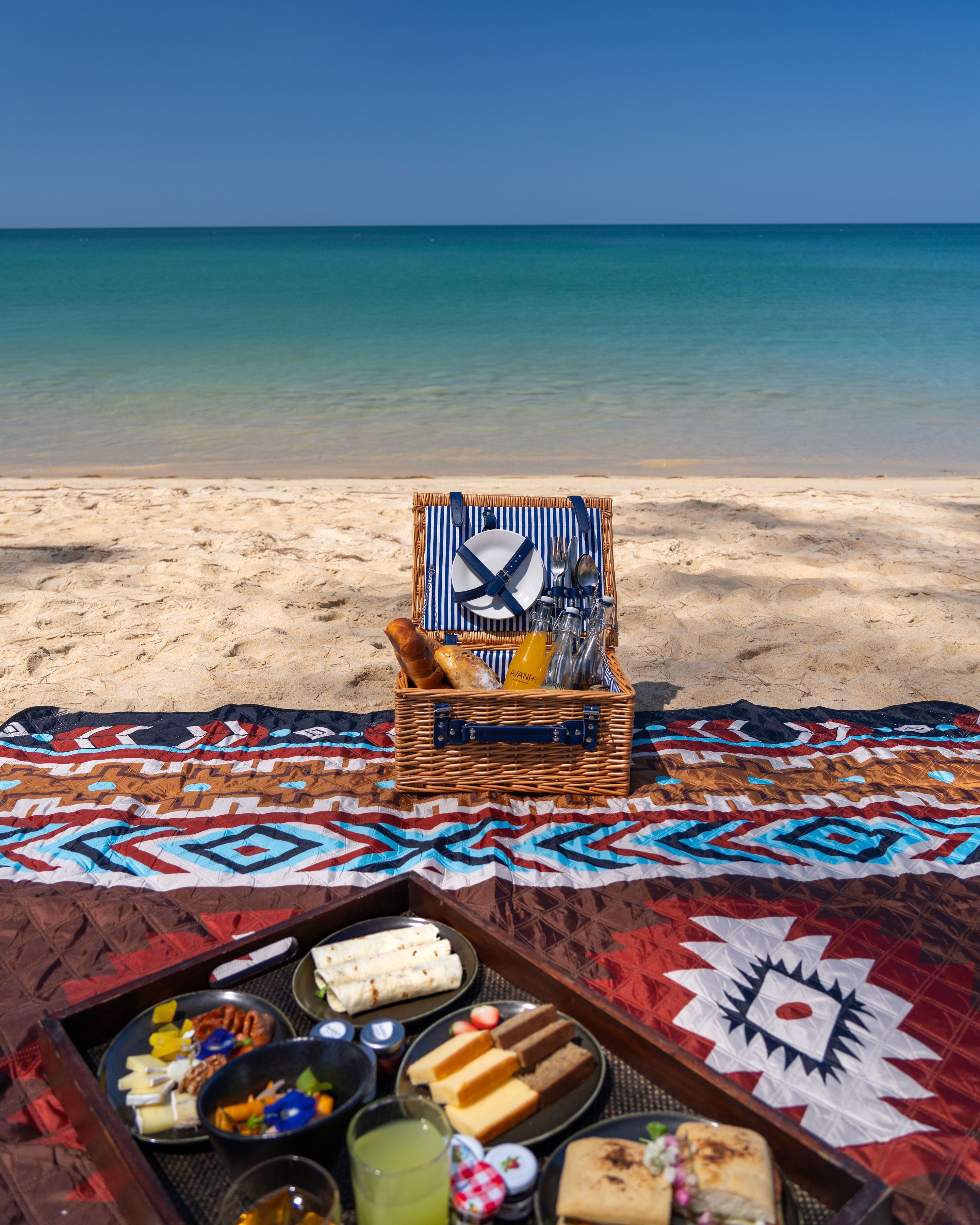 on the beach, white sand, beach towels, beach yoga