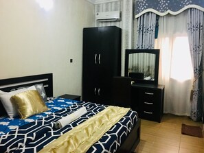 Habitación superior | Caja de seguridad en la habitación, wifi gratis y ropa de cama 