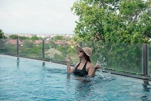 Outdoor pool, open 7:00 AM to 7:00 PM, sun loungers