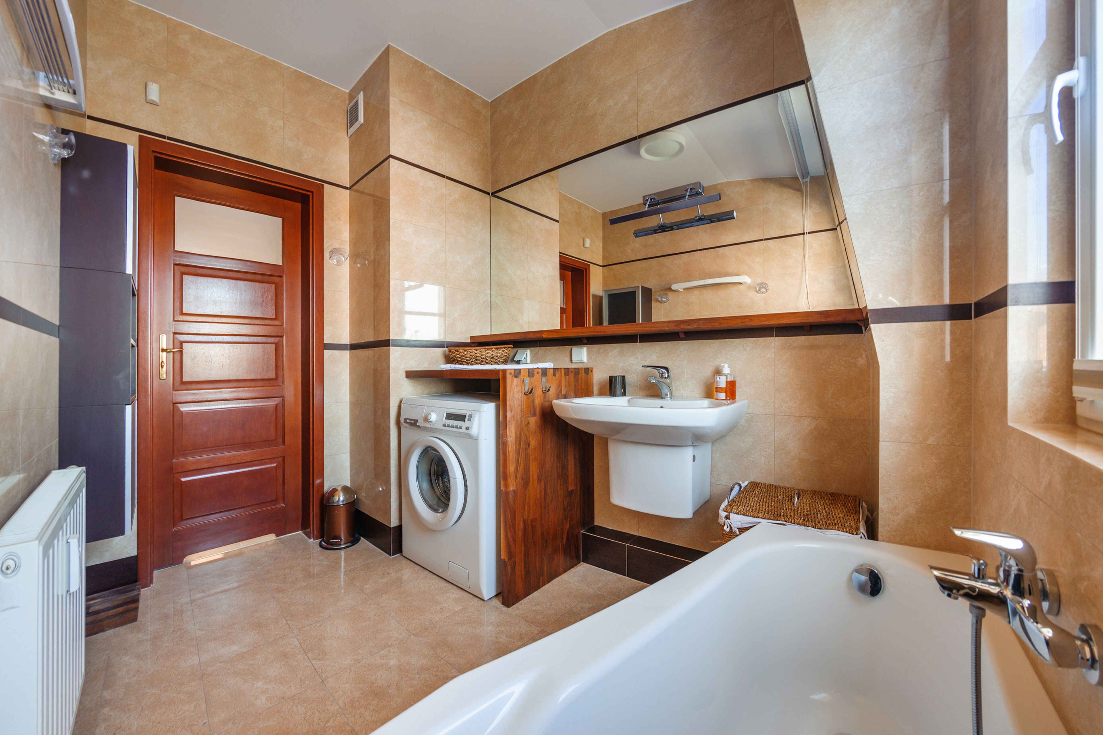 Appartement (Łokietka 49A/13) | Badkamer | Een douche, een haardroger, handdoeken