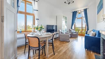 Apartment (Traugutta 8/1) | Living area | Flat-screen TV, fireplace