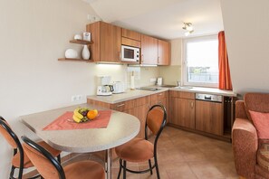 Departamento, 1 habitación, balcón (Nr. 34) | Área de sala de estar | Televisión LED