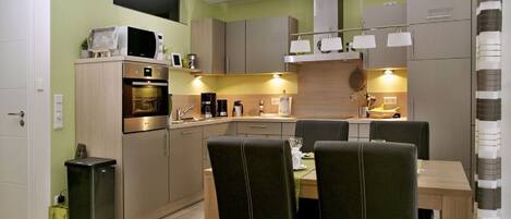 Apartment, 2 Bedrooms, Terrace, Garden Area | In-room dining