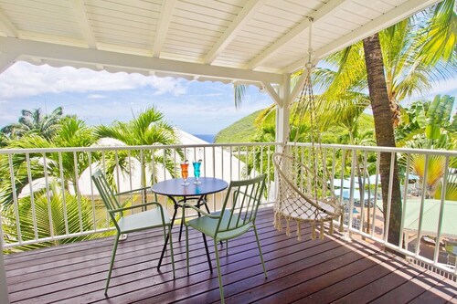 Appartements "O Coeur de Deshaies", Amandiers. Terrasse, piscine, clim, parking.