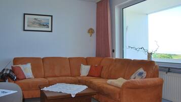 Apartment, 2 Bedrooms, Sea View | Living area | TV