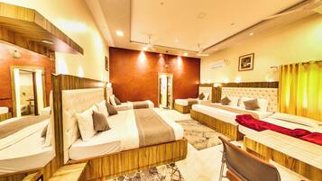 Family Room, 3 Double beds | In-room safe, desk, free WiFi
