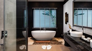 A modern bathroom with a freestanding bathtub, a large mirror, and a glass-enclosed shower. - Crystal Pool Villa (Rawai)