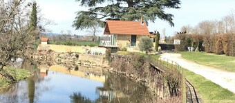Old fisherman's cottage renovated on the banks of the river sure beautiful closed ground.