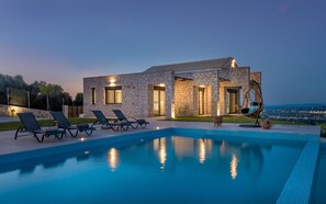 Outdoor pool, pool umbrellas, pool loungers
