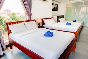 Kamar Triple Superior | Wi-Fi gratis dan seprai linen