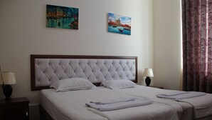 Double or Twin Room | Laptop workspace, blackout drapes, WiFi (free), bed sheets - Hotel Grandway (Tashkent)