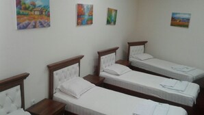 Standard Quadruple Room | Laptop workspace, blackout drapes, WiFi (free), bed sheets - Hotel Grandway (Tashkent)
