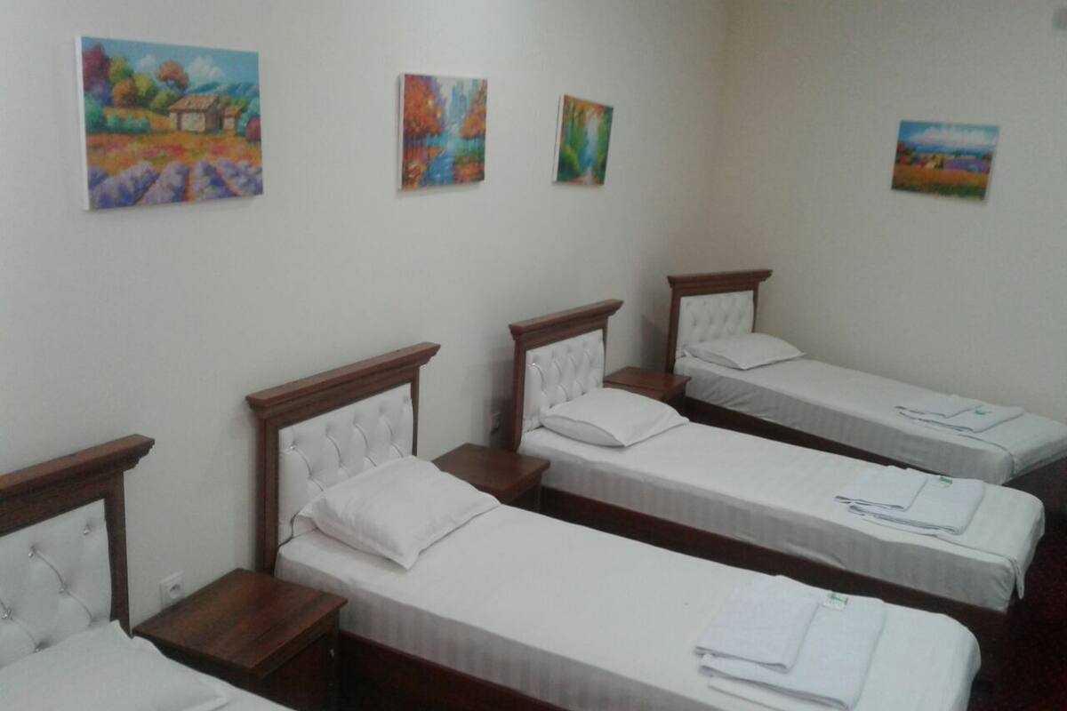 Standard Quadruple Room | Laptop workspace, blackout drapes, WiFi (free), bed sheets