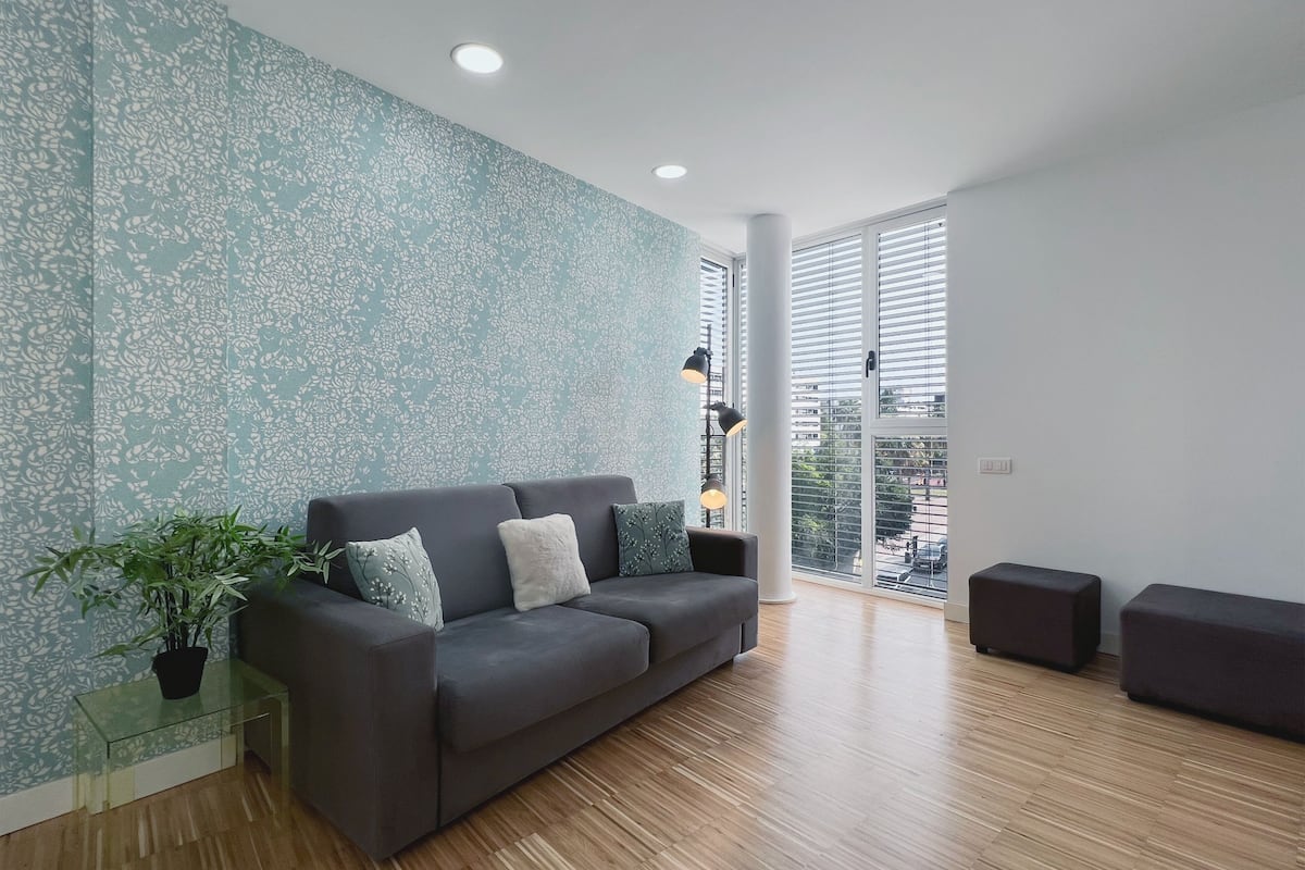 Apartment (2 Bedrooms) | Living area | 65-inch TV with digital channels