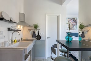 Traditional Apartment, 2 Bedrooms, Balcony, Mountain View | Private kitchen | Fridge, microwave, stovetop, coffee/tea maker