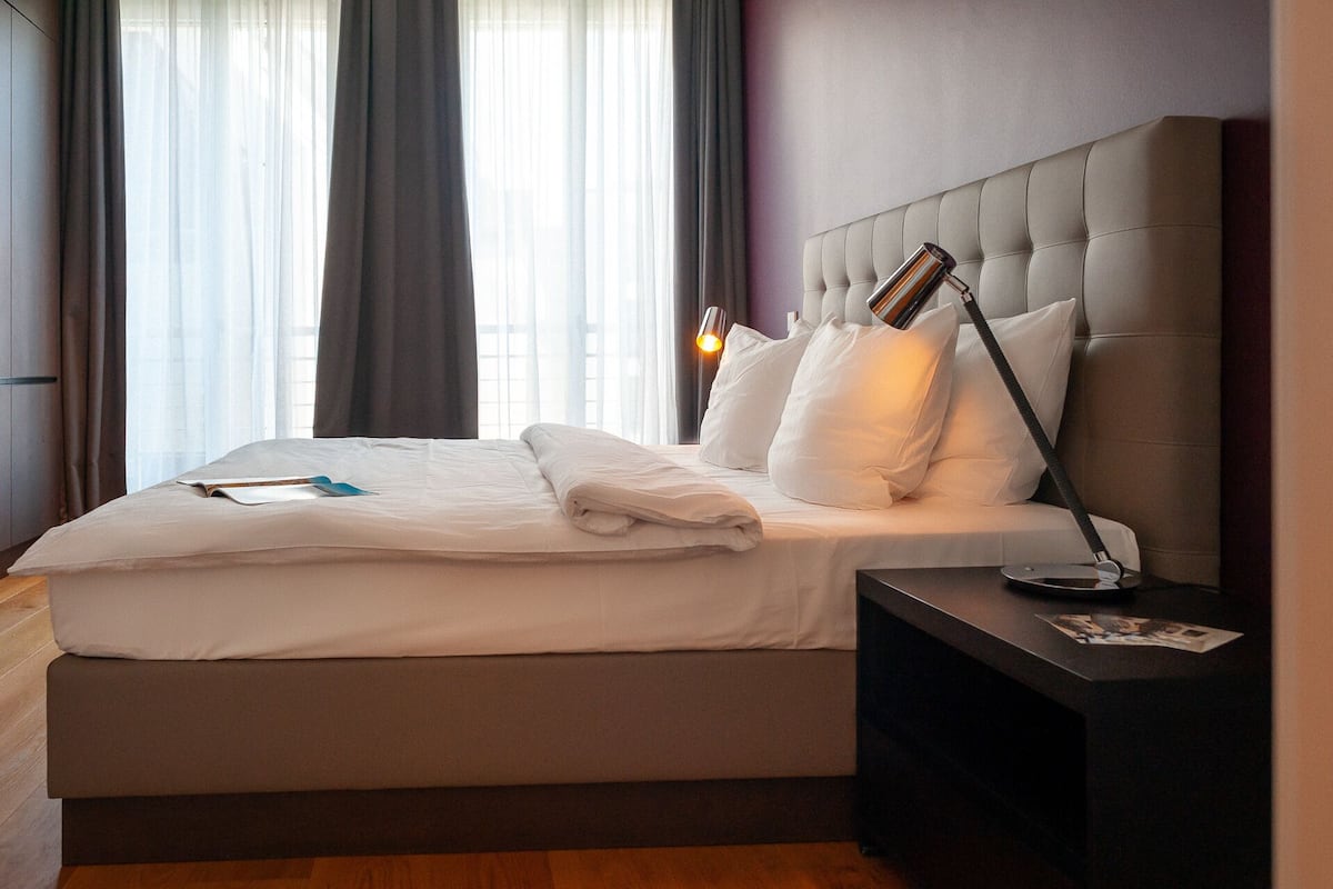 Premium Apartment, 1 Bedroom | 1 bedroom, in-room safe, individually decorated, individually furnished