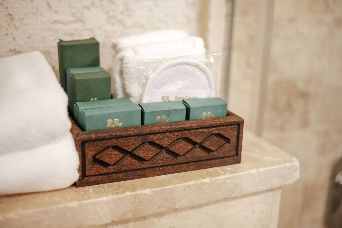 panoramic suite | bathroom | shower, rainfall showerhead, hair dryer, bathrobes