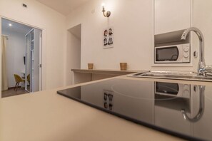 Microwave, stovetop, electric kettle, toaster