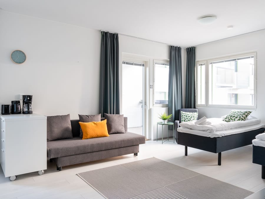 Standard Apartment, 1 Bedroom, Balcony | Living area | TV