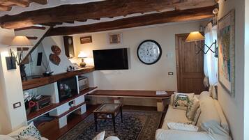 Smart TV, fireplace, table tennis, books