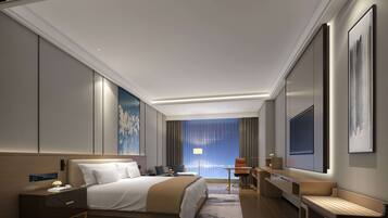 Een minibar, een kluis op de kamer, een bureau, verduisterende gordijnen