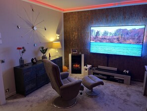 Smart TV, fireplace, video games, DVD player