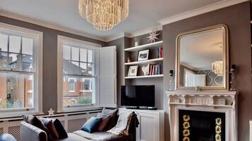 Flat-screen TV, fireplace