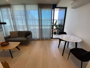 Apartment (1 Bedroom) | Living area