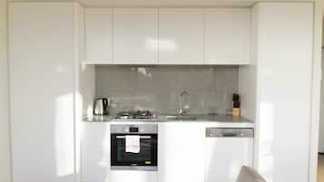 Apartment (1 Bedroom) | Private kitchen | Fridge, microwave, oven, stovetop