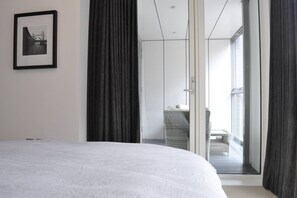 1 bedroom, desk, iron/ironing board, bed sheets