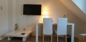 Departamento empresarial | Área de sala de estar | Televisión de pantalla plana