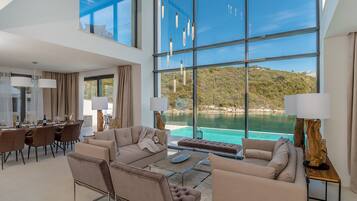 Villa, Private Pool | Living area | Flat-screen TV