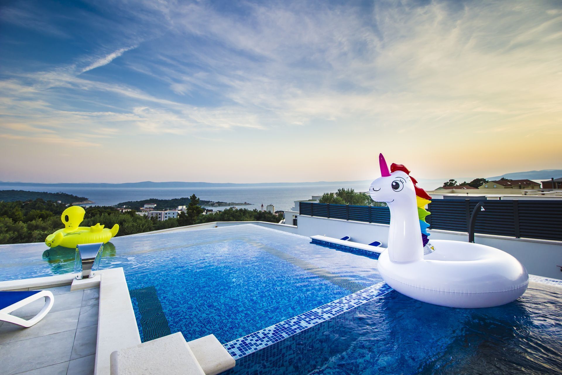Seasonal outdoor pool, pool umbrellas, pool loungers