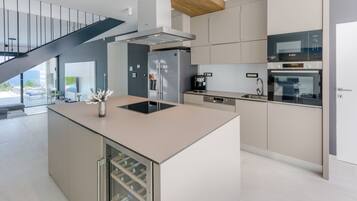 Villa | Private kitchen | Full-sized fridge, microwave, oven, stovetop