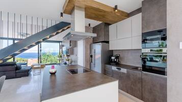 Villa | Private kitchen | Full-sized fridge, microwave, oven, stovetop