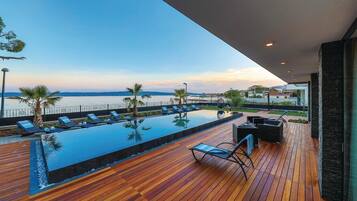 Outdoor pool, sun loungers