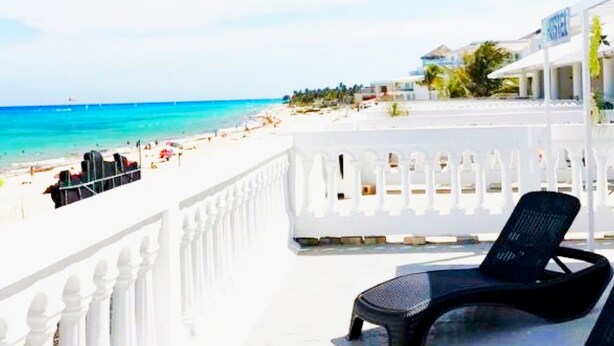 Unclassified image, 1 of 85, button - Tribe on the Beach (Playa del Carmen)