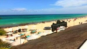 Unclassified image, 4 of 85, button - Tribe on the Beach (Playa del Carmen)