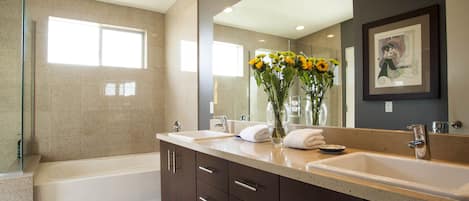 Bathtub, hair dryer, towels, soap