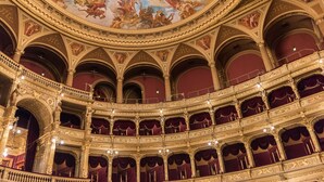 A grand theater with multiple balconies and ornate golden detailing. - Pullman Budapest (Budapest)