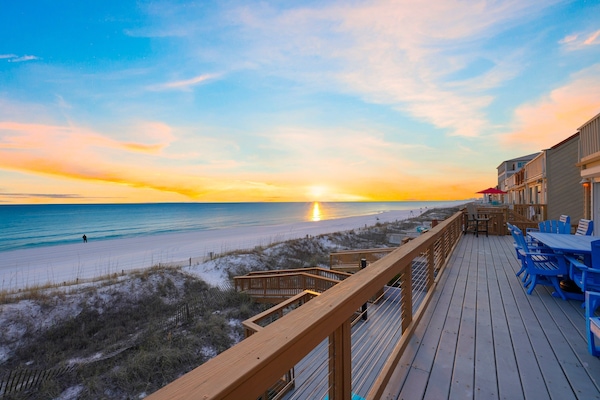 Unwind in beautifully updated interiors just steps from the sand