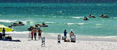 Enjoy water sports and leisure activities on this public beach with access to jet skis and parasailing.