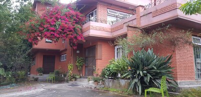 It is our family home located away from hustle and bustle of city .