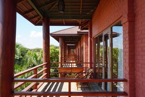 Quarto luxo, vista para o jardim | Vista do quarto