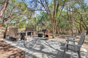 Patio area with grill and chimney - Mountain Laurel I 2Br Cabin near Square! (Wimberley)